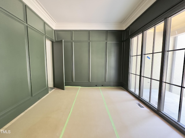 7208 Tanbark Way, Raleigh, NC 27615 - interior space featuring crown molding, plenty of natural light, a decorative wall, and visible vents