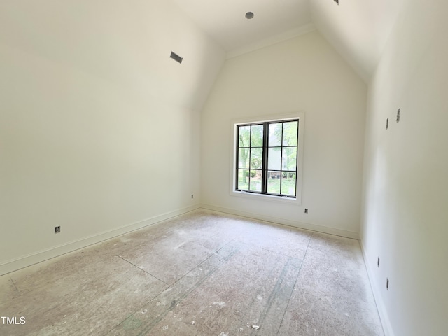 7208 Tanbark Way, Raleigh, NC 27615 - unfurnished room with baseboards and lofted ceiling