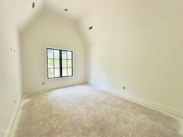 7208 Tanbark Way, Raleigh, NC 27615 - spare room featuring baseboards and lofted ceiling