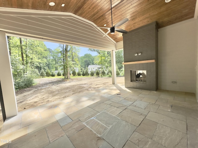 7208 Tanbark Way, Raleigh, NC 27615 - view of patio featuring a ceiling fan and view of scattered trees