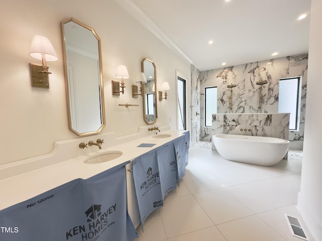 7208 Tanbark Way, Raleigh, NC 27615 - full bath with double vanity, a freestanding bath, a marble finish shower, recessed lighting, and tile patterned flooring