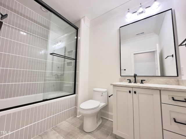 7208 Tanbark Way, Raleigh, NC 27615 - bathroom featuring vanity, tiled shower / bath, and tile patterned flooring