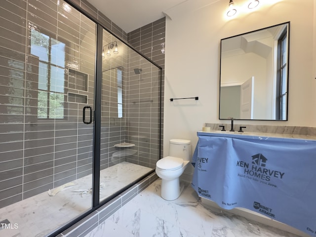 7208 Tanbark Way, Raleigh, NC 27615 - full bath featuring toilet, marble finish floors, a shower stall, and vanity
