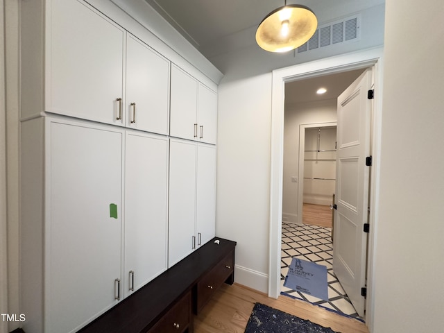 7208 Tanbark Way, Raleigh, NC 27615 - mudroom featuring light wood-type flooring and recessed lighting