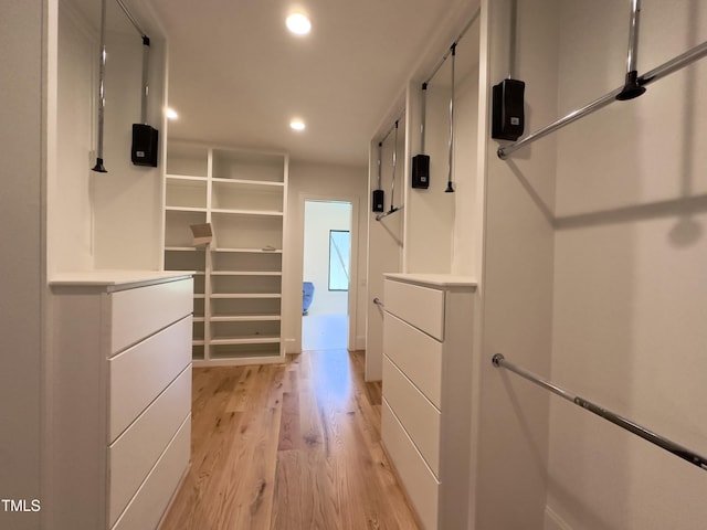 7208 Tanbark Way, Raleigh, NC 27615 - spacious closet with light wood-style floors