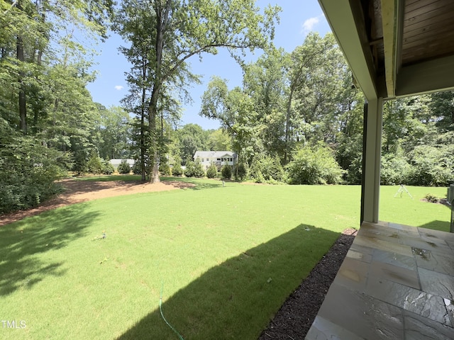 7208 Tanbark Way, Raleigh, NC 27615 - view of grassy yard featuring view of scattered trees