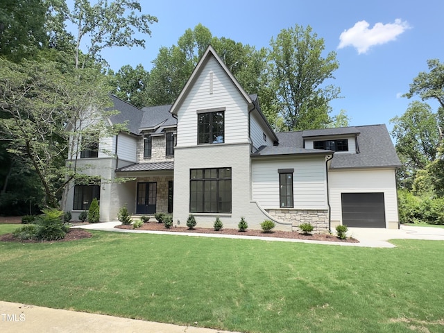 7208 Tanbark Way, Raleigh, NC 27615 - view of front of property with stone siding, a front lawn, an attached garage, and roof with shingles