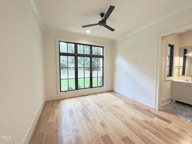 7208 Tanbark Way, Raleigh, NC 27615 - unfurnished room with crown molding, ceiling fan, and wood finished floors