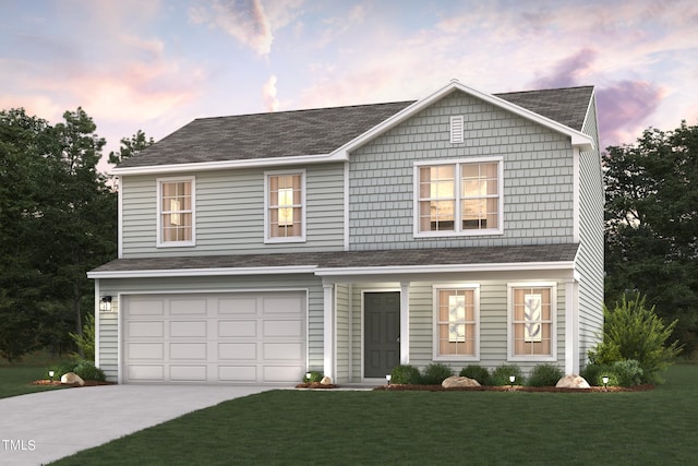 traditional-style house featuring a front yard, driveway, and an attached garage