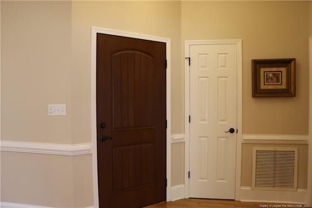 entrance foyer with wood-type flooring