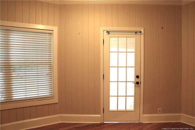 doorway with hardwood / wood-style floors