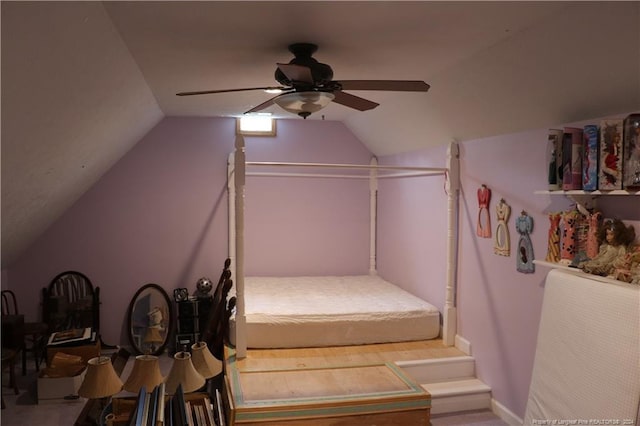 bedroom with ceiling fan and lofted ceiling