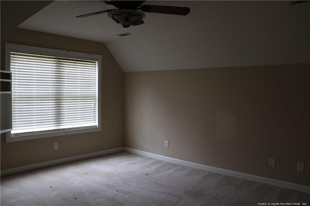 bonus room featuring ceiling fan, vaulted ceiling, and carpet floors