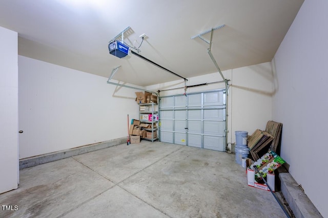 garage featuring a garage door opener