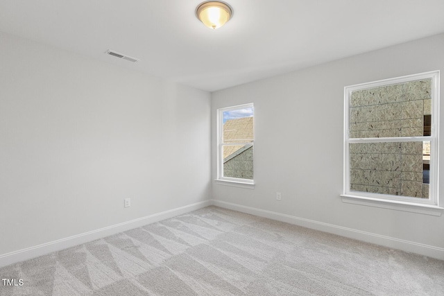 view of carpeted spare room