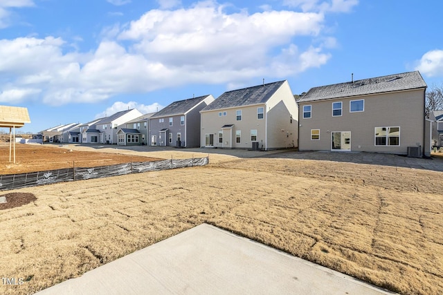 back of property with central AC unit