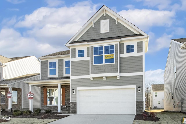 craftsman house featuring a garage