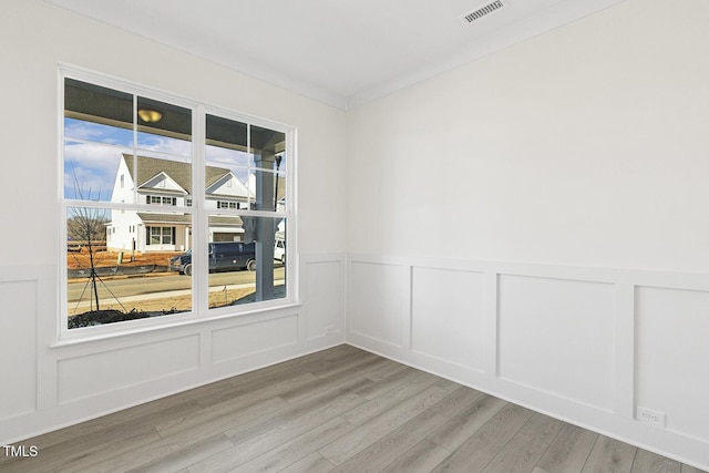 empty room with light wood-type flooring