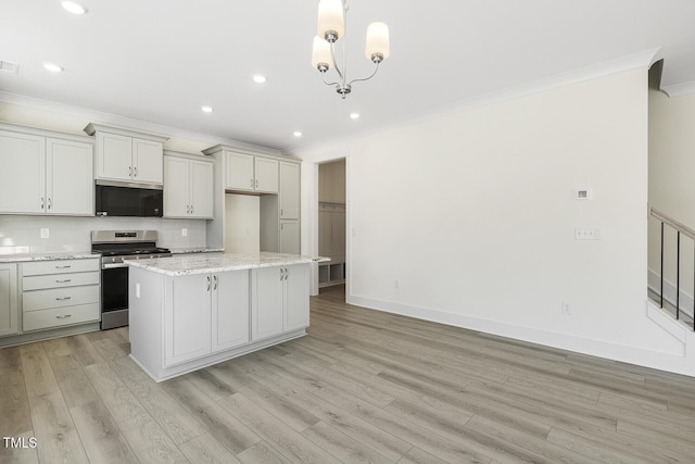 kitchen with crown molding, light stone countertops, pendant lighting, a kitchen island, and stainless steel range with electric cooktop