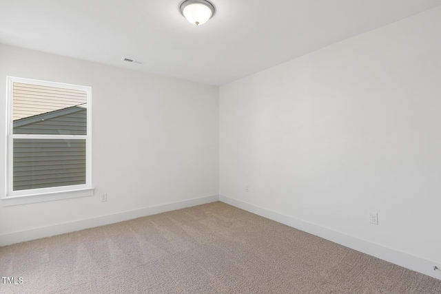 unfurnished room with carpet