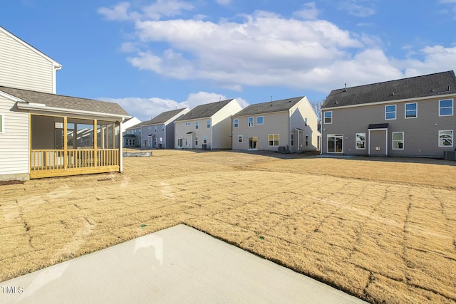 view of yard with central air condition unit