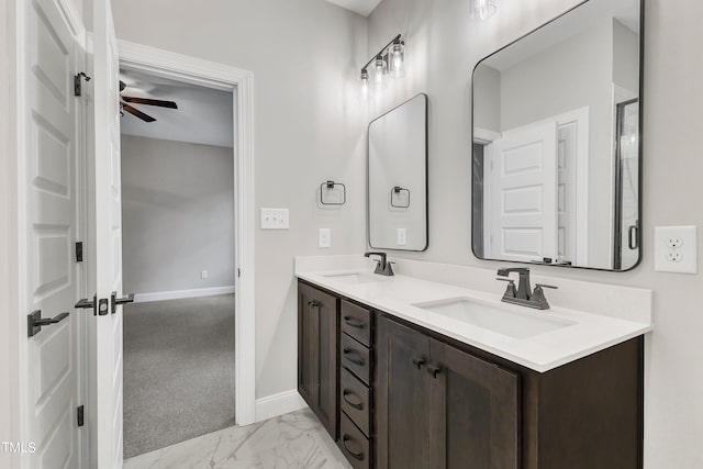 bathroom featuring vanity and ceiling fan