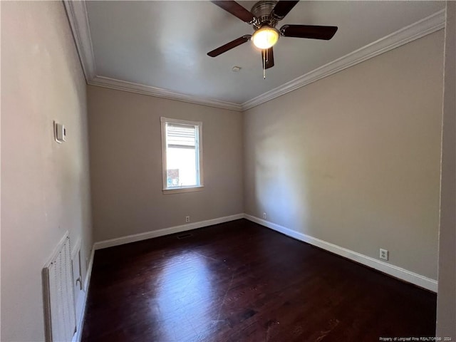 empty room featuring ornamental molding, ceiling fan, and dark hardwood / wood-style flooring