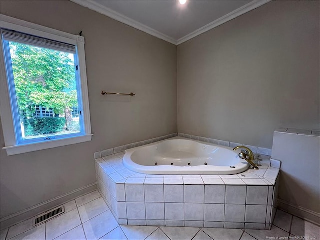 bathroom featuring crown molding, tile patterned flooring, tiled bath, and plenty of natural light