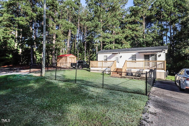 view of yard featuring a wooden deck