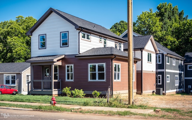 view of front of home featuring central AC unit