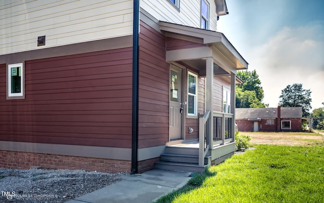 view of home's exterior featuring a yard