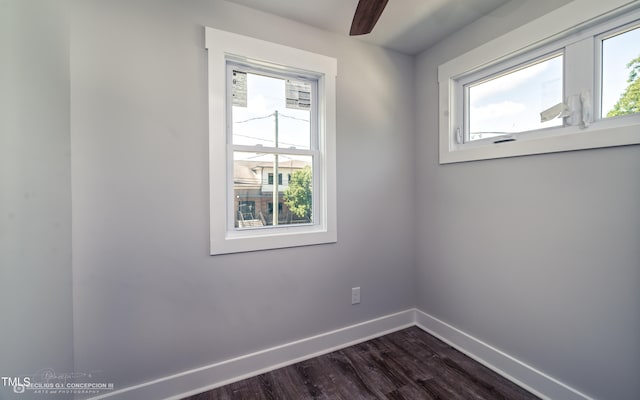 unfurnished room with plenty of natural light and hardwood / wood-style flooring