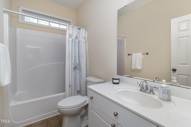 full bathroom featuring vanity, tile patterned floors, toilet, and shower / bathtub combination with curtain