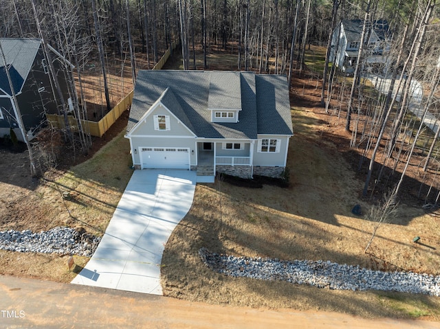 view of front of property featuring a front yard and a porch