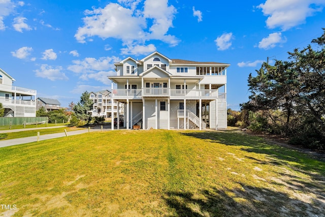 view of front of property with a front yard and covered porch