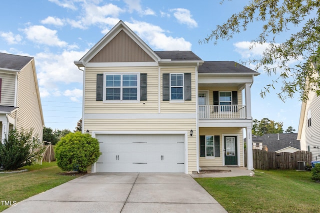 view of front of property with a balcony, central air condition unit, a garage, and a front lawn