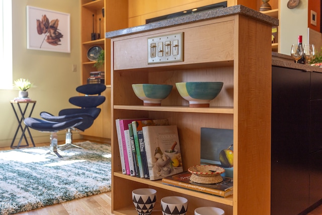 interior details with hardwood / wood-style flooring