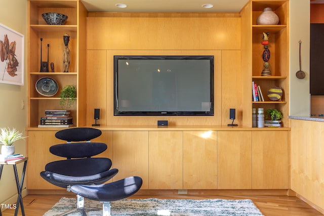 interior space with built in features and light wood-type flooring