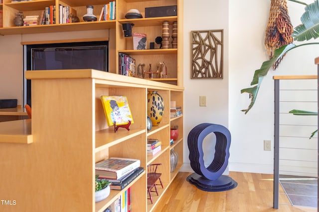 interior space with hardwood / wood-style flooring