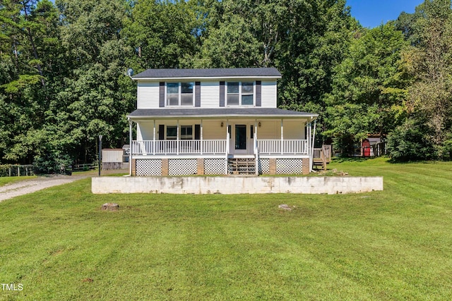 country-style home featuring a front lawn and a porch