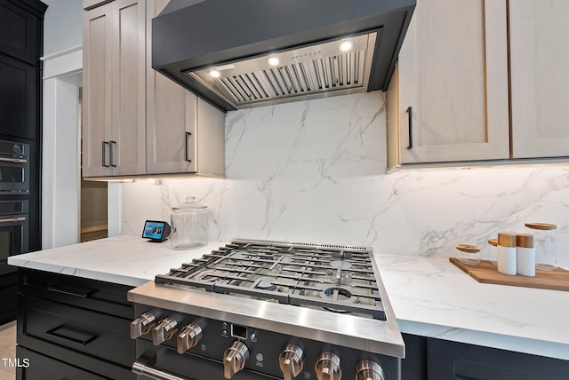 kitchen featuring range, decorative backsplash, and custom range hood