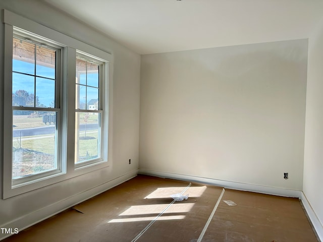 spare room featuring a wealth of natural light