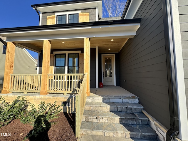 doorway to property with covered porch