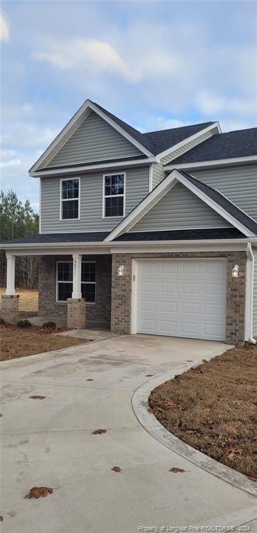 view of front of property featuring a garage