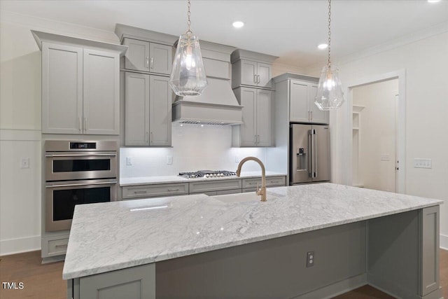 kitchen featuring gray cabinets, light stone countertops, sink, and stainless steel appliances