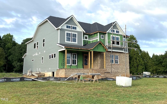 view of front facade featuring a front yard