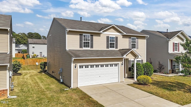 traditional home with a garage, a front lawn, fence, roof with shingles, and driveway