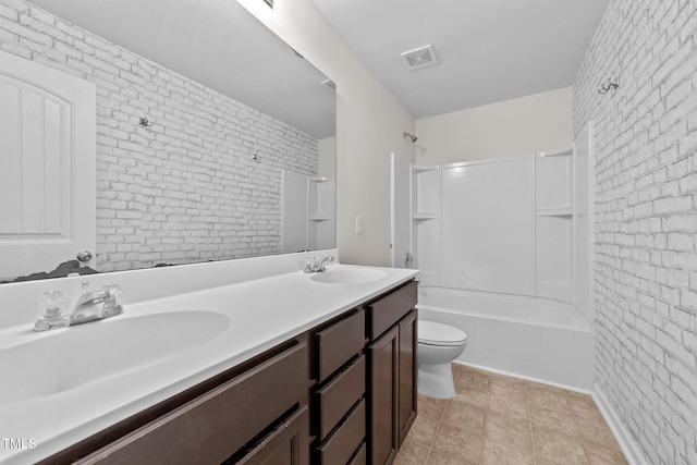 bathroom featuring a sink, tub / shower combination, toilet, and visible vents