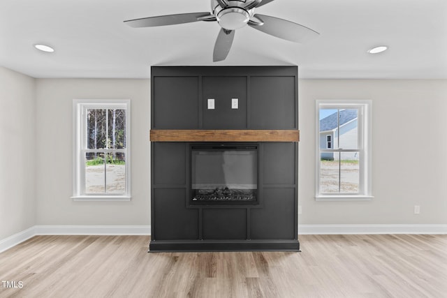 details with ceiling fan and wood-type flooring