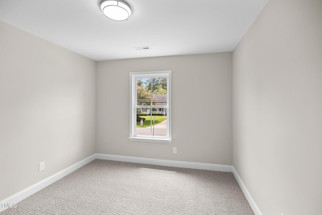 empty room featuring carpet floors